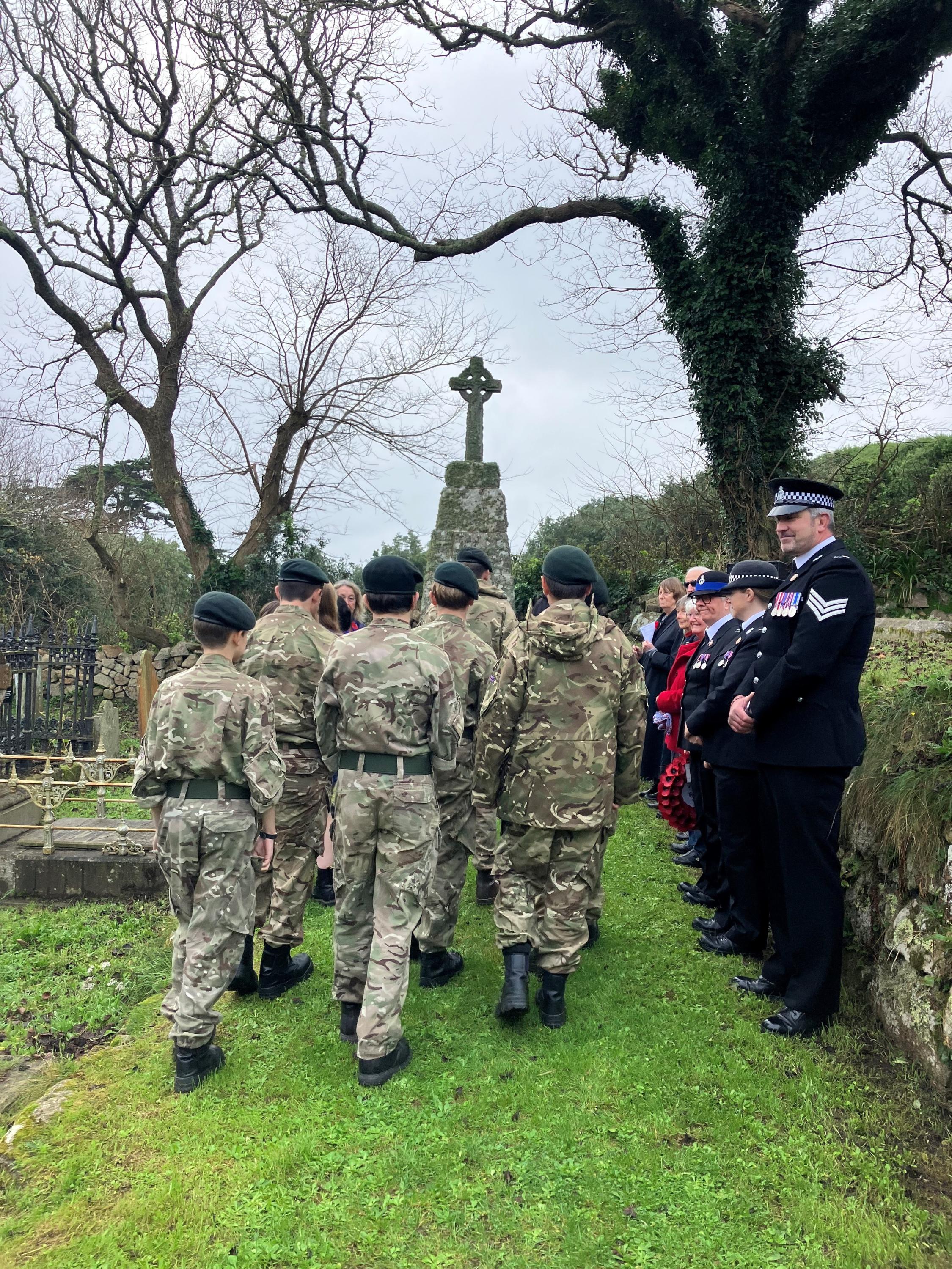 Representatives from the Police, Council, Army cadets, Five Islands Academy, Methodist Church and Church of England gathered around the War Memorial in Old Town, St Mary's.