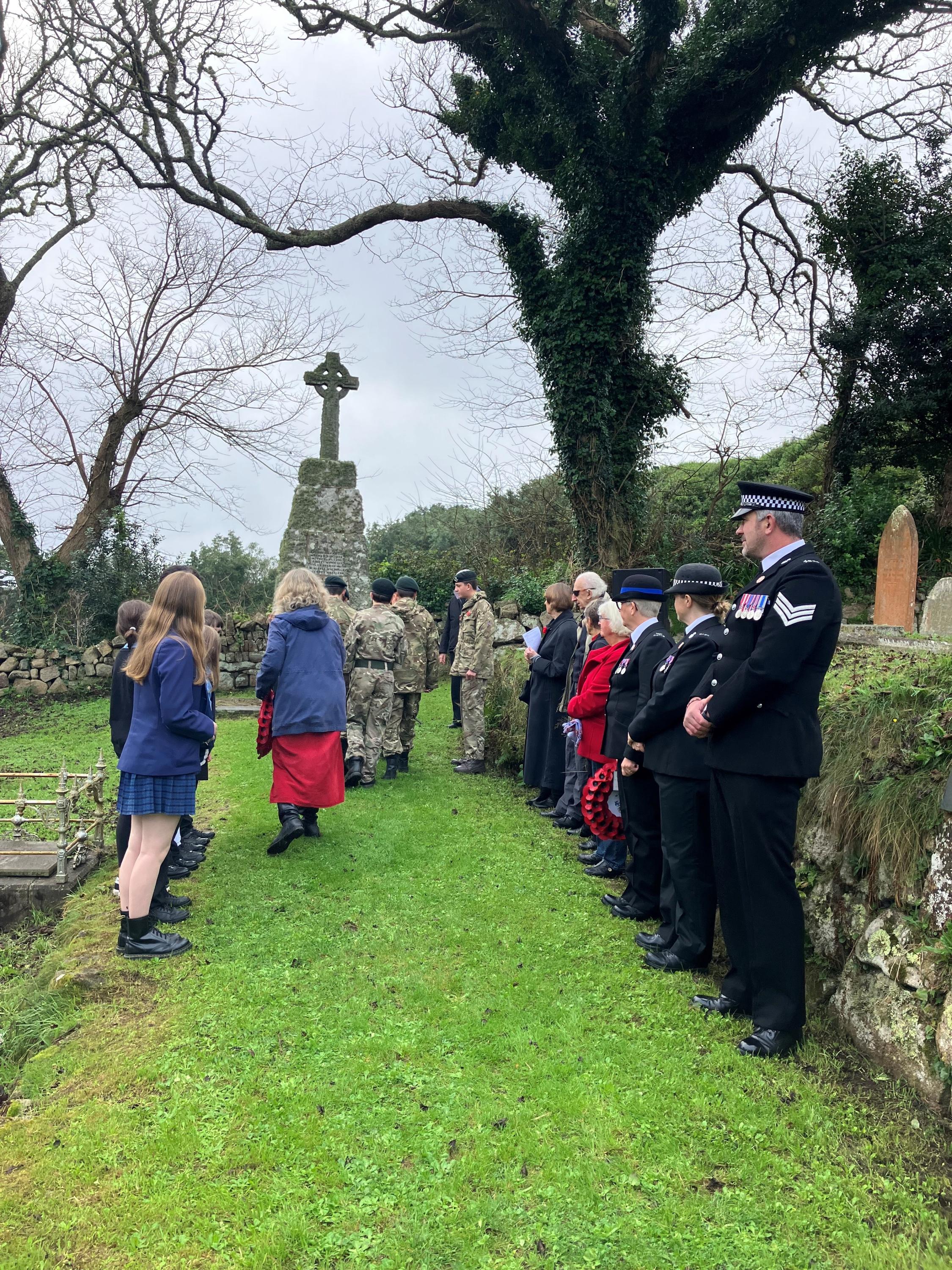 Representatives from the Police, Council, Army cadets, Five Islands Academy, Methodist Church and Church of England gathered around the War Memorial in Old Town, St Mary's.