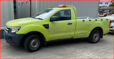 Image of a green Ford Ranger which is for sale by sealed bid for parts or repairs