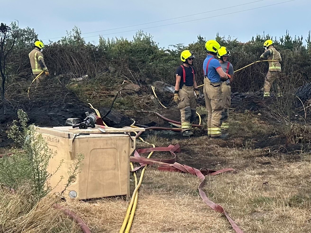 Crews extinguish hotspots following the fire on St Mary’s on Sunday 24 August 2025